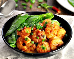 Juicy shrimp are sautéed with vegetables